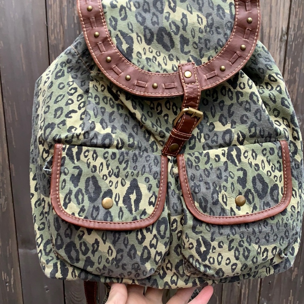 Chateau back pack style purse in Camo color animal print & brown contrast trim